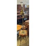 An Edwardian brass lamp standard with table baseCONDITION: Late fitted for electricity, the