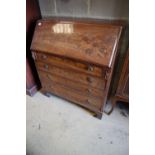 A George III mahogany bureau, fitted four long drawers, width 99cmCONDITION: Overall fair colour,