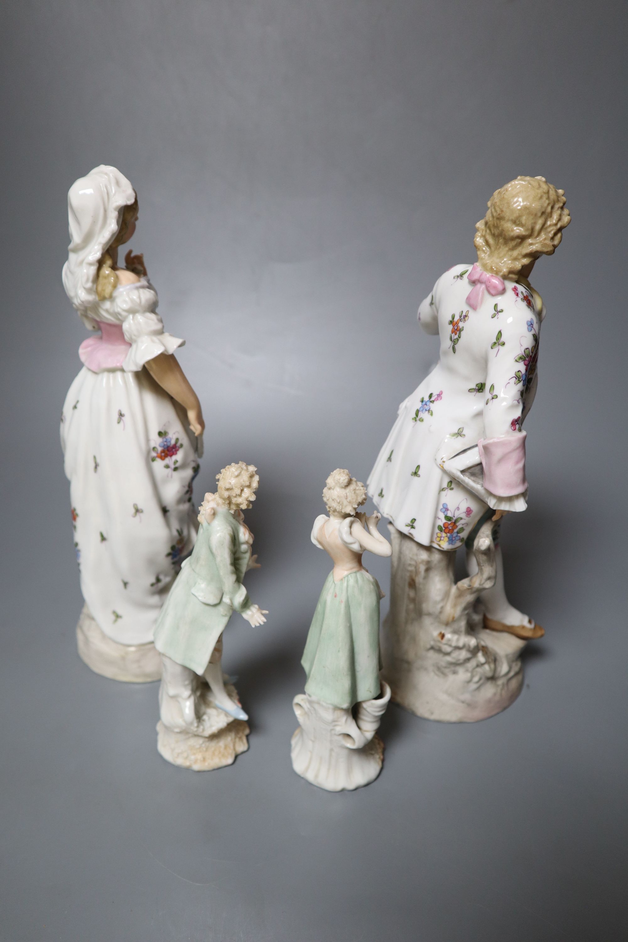 Two pairs of Continental porcelain figures of a man and woman, 15cm and 26cmCONDITION: Taller - Image 6 of 7