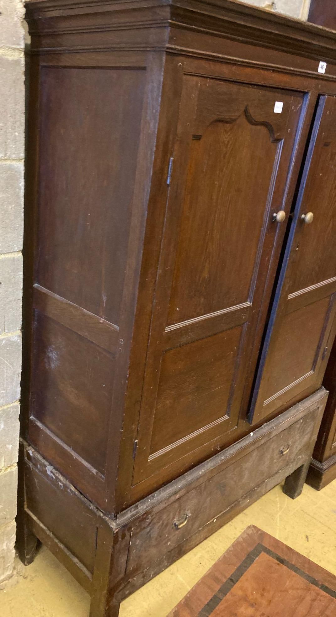 An 18th century oak press cupboard with base drawer, width 120cm height 169cmCONDITION: Overall - Image 3 of 3