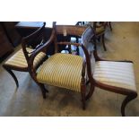 A Regency mahogany carver and a pair of dining chairs (3)CONDITION: Carver a little faded with old