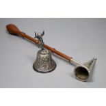 A modern silver table bell with putti handle, and a modern silver and turned wood handle candle