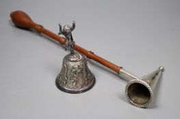 A modern silver table bell with putti handle, and a modern silver and turned wood handle candle