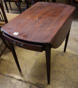 A George III mahogany Pembroke table, with oval top and moulded squared legs, width 77cmCONDITION: