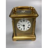 A late 19th century French brass carriage timepiece, 13cm high to handleCONDITION: The white