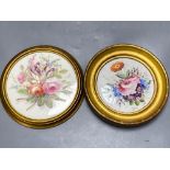 Two early 19th century circular wall plaques, each painted with floral bouquets, one Derby, 18cm and