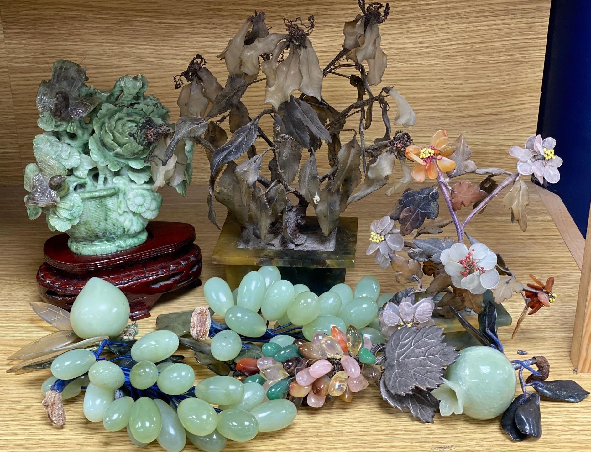 A group of hardstone grapes and floral displays and jadeite carvings