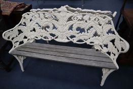 A pair of Coalbrookdale style cast iron garden benches, in fern pattern, with teak slats, width