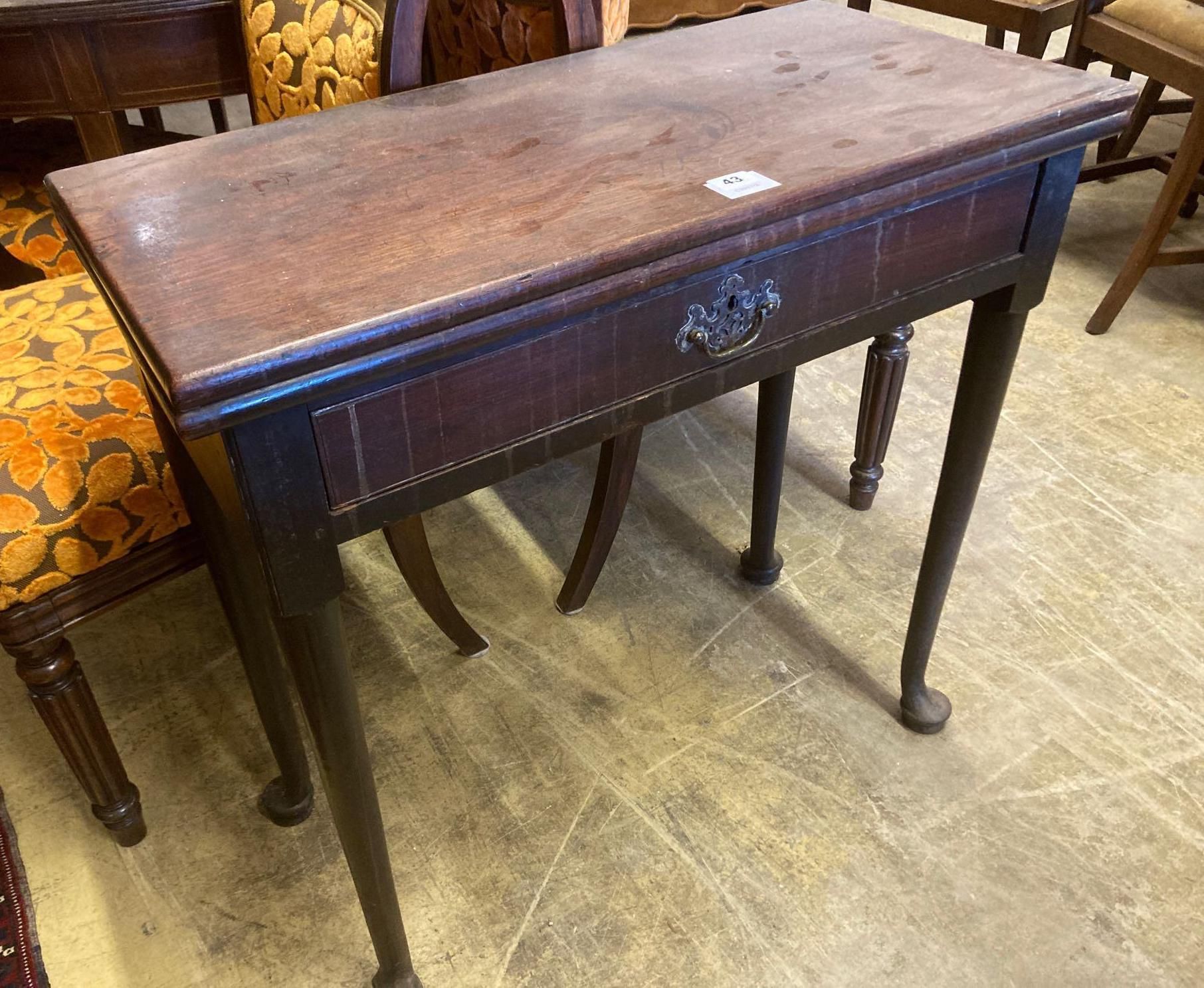 A mid 18th century mahogany folding top tea table, with frieze drawer, width 76cmCONDITION: Good