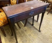 A mid 18th century mahogany folding top tea table, with frieze drawer, width 76cmCONDITION: Good