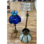 A brass column lamp and a brass standard lamp on three paw feet (with shades)CONDITION: The taller