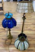 A brass column lamp and a brass standard lamp on three paw feet (with shades)CONDITION: The taller