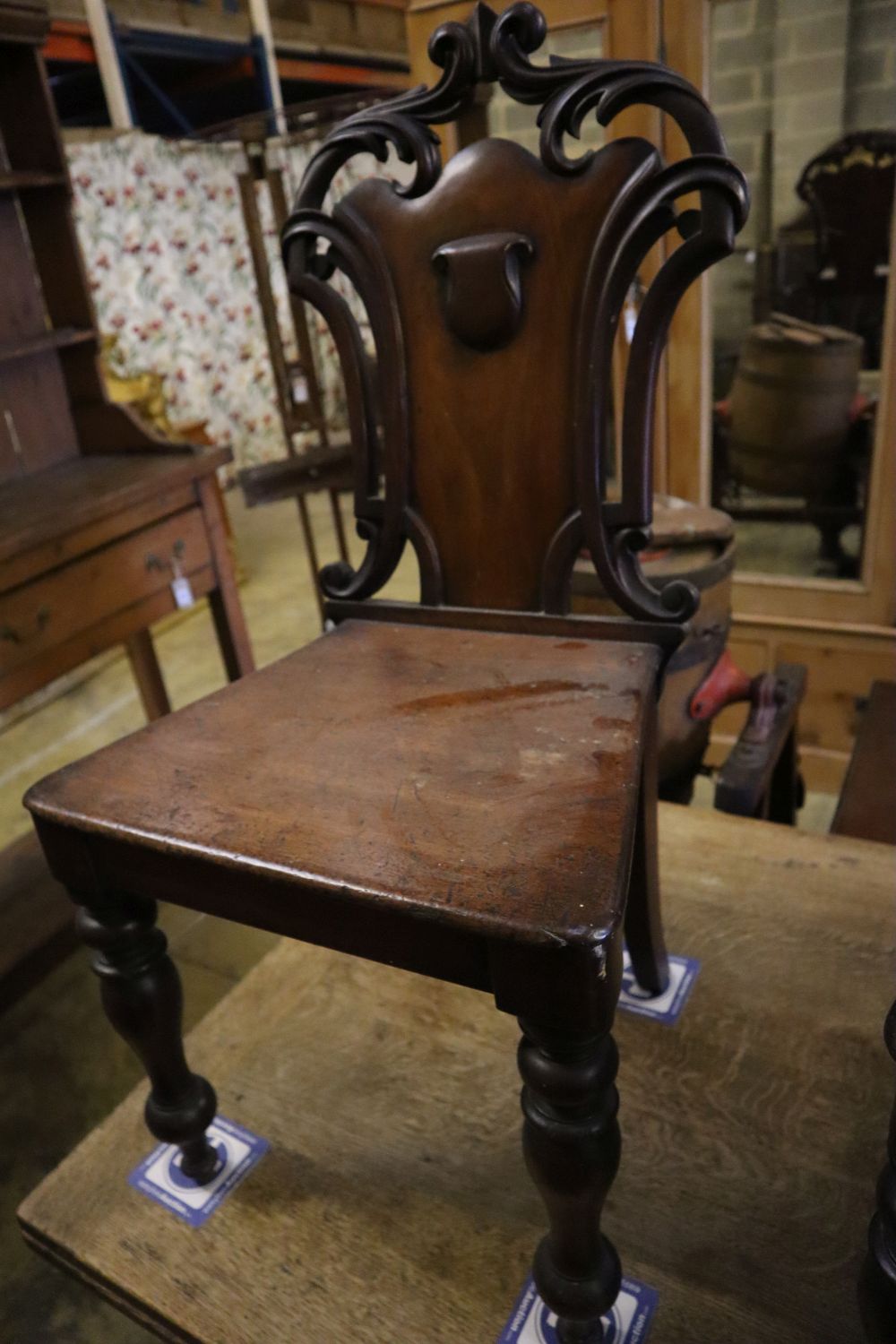 A pair of Victorian mahogany hall chairs (one a.f.)CONDITION: Fair wear and tear, one chairs has the - Image 3 of 3