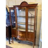 An Edwardian inlaid mahogany bow fronted china display cabinet, width 114cm height 191cmCONDITION: