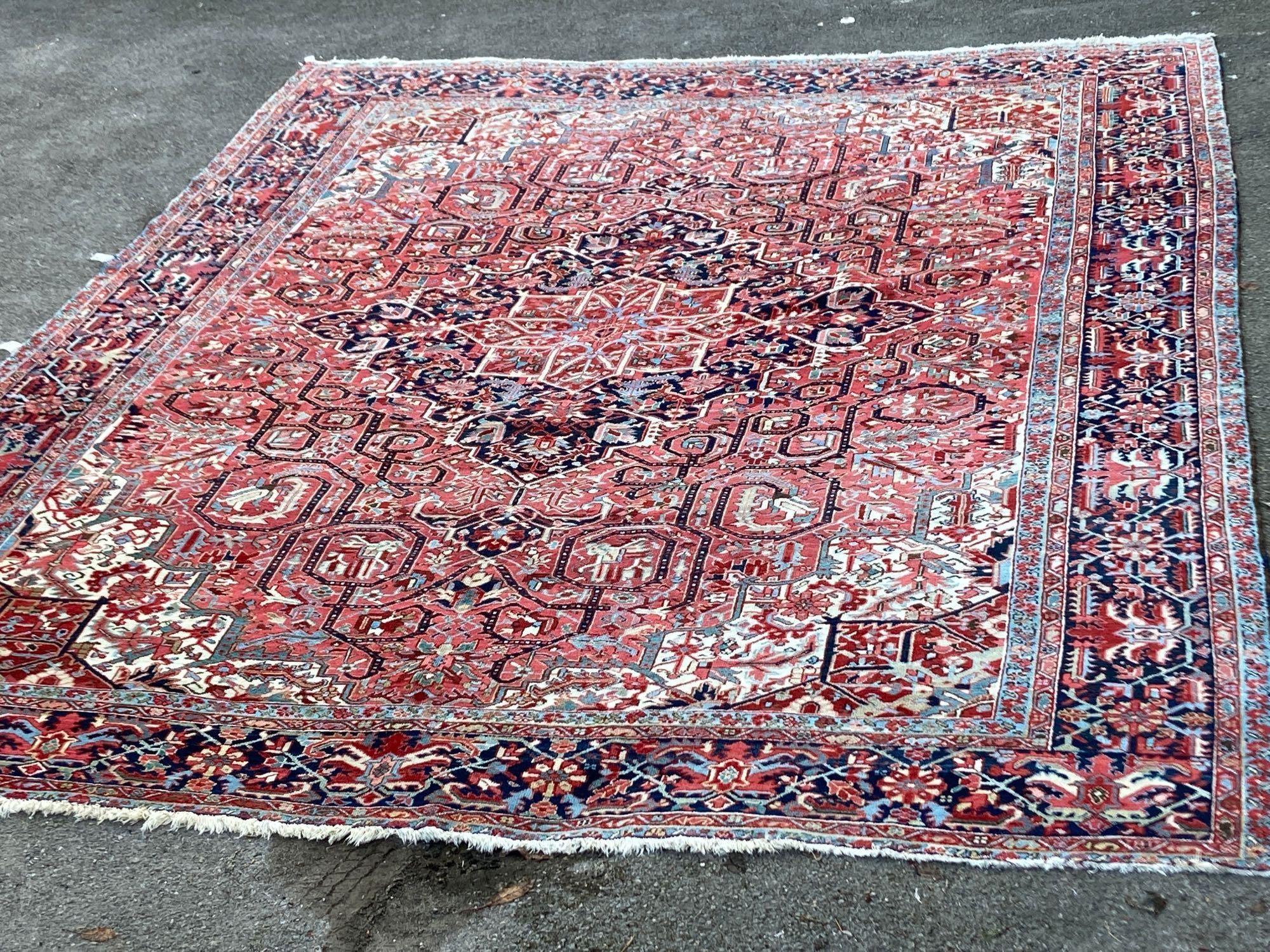 A large Persian red ground carpet, 444 x 347cmCONDITION: Looks to be in good condition, probably