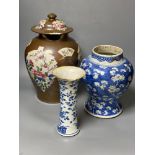Two Chinese Kangxi period blue and white vases and a Qianlong Batavia vase and cover, largest 36cm