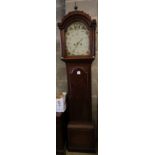 A George III mahogany eight day longcase clock, the painted arched dial signed J.N. Joyce of
