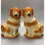 A pair of modern Staffordshire pottery dogs, 33cmCONDITION: One dog with a series of glaze
