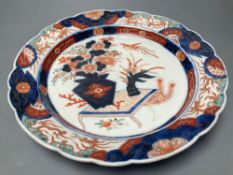 A 19th century Imari dish, painted in typical palette, 30.5cm diameterCONDITION: There is slight