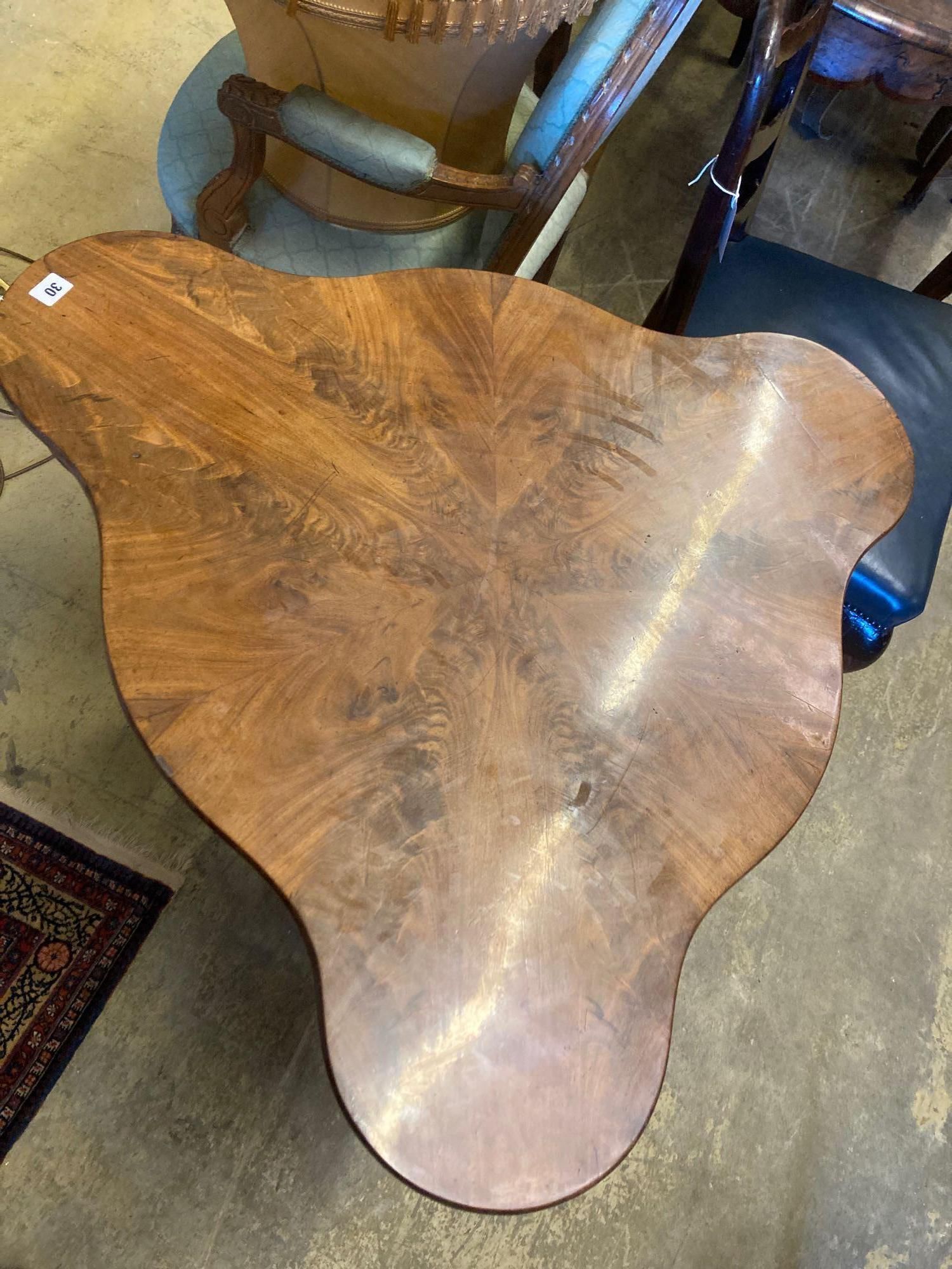 A Continental mahogany trefoil corner table, width 88cmCONDITION: Has bee repolished at some - Image 3 of 3