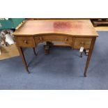 An Edwardian satinwood banded mahogany writing table, the concave front 98cmCONDITION: Rather