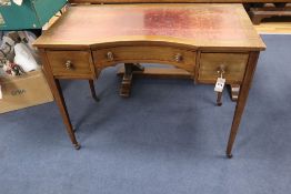 An Edwardian satinwood banded mahogany writing table, the concave front 98cmCONDITION: Rather