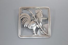 A Georg Jensen sterling 'Cockerel and foliate spray' square brooch, designed by Arno Malinowski, no.