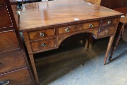 A George III mahogany dressing table, with crossbanded and five small drawers, width 107cmCONDITION: