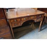 A George III mahogany dressing table, with crossbanded and five small drawers, width 107cmCONDITION: