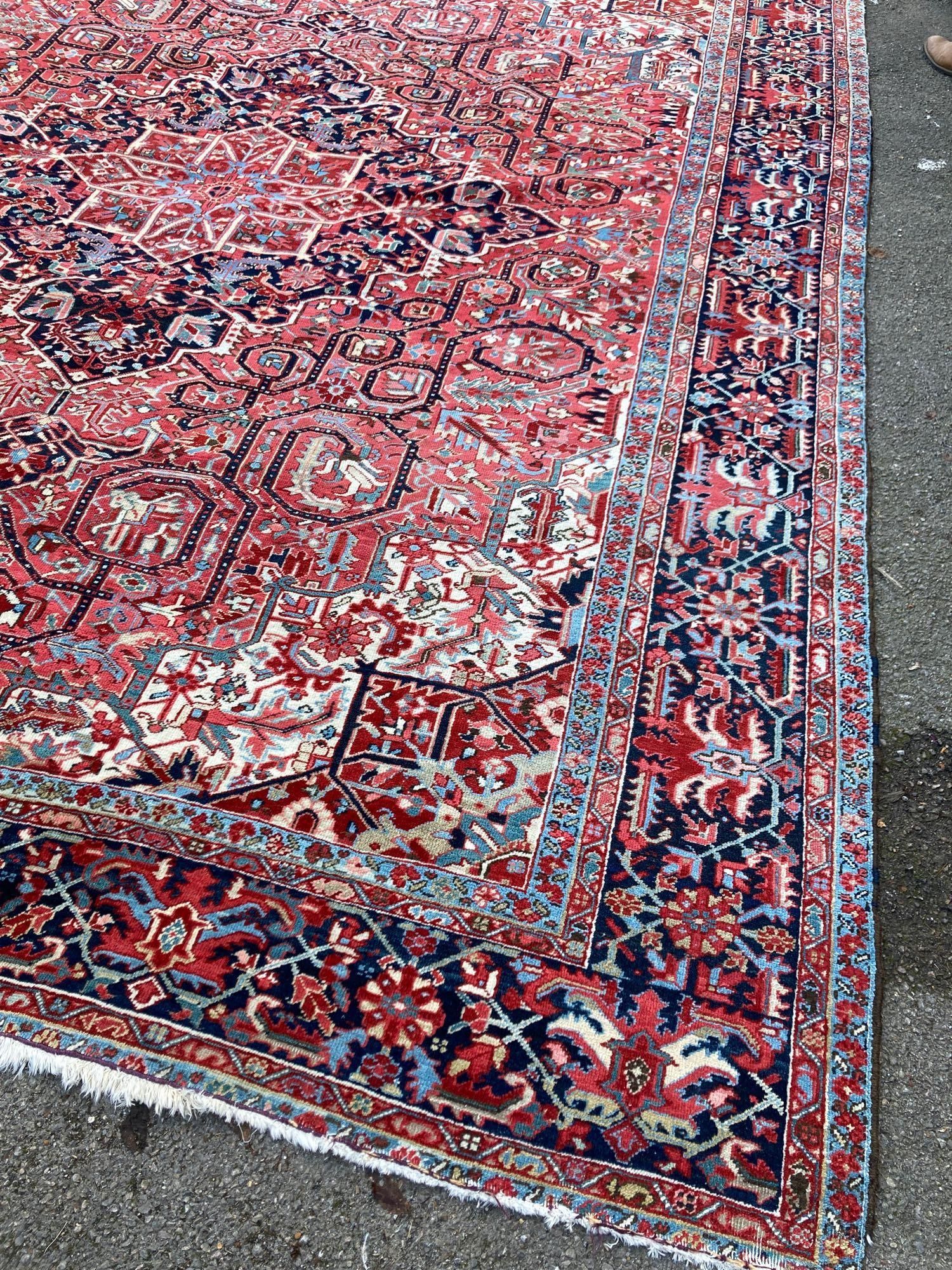 A large Persian red ground carpet, 444 x 347cmCONDITION: Looks to be in good condition, probably - Image 3 of 3