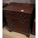 A small mahogany chest fitted brushing slide and four long drawers, width 62cmCONDITION: Rather worn