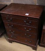 A small mahogany chest fitted brushing slide and four long drawers, width 62cmCONDITION: Rather worn