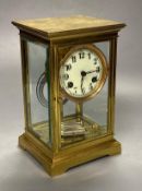 A lacquered brass four-glass mantel clock, Waterbury Clock Co., USA, gong striking movement,