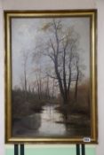 H. Martin, oil on canvas, Waterside trees in autumn, signed, 58 x 38cmCONDITION: Possibly in need of