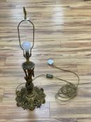 A gilt metal table lampCONDITION: There are several drill holes to the base, most likely in the