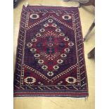 A North West Persian madder ground rug, 125 x 88cmCONDITION: Very good clean condition.