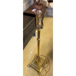 An Edwardian lacquered brass telescopic lamp standardCONDITION: Some light oxidisation otherwise