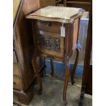 An Edwardian carved walnut bedside cabinet, with marble top and ceramic lined interior, width 41cm