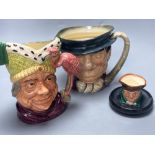 A Royal Doulton Ugly Duchess character jug, Royal Doulton Tony Weller musical character jug and