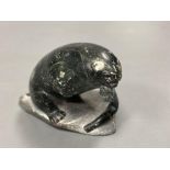 A carved inuit sculpture of a seal, signed 'Markossie SCP', 5cm highCONDITION: It does have all over