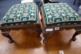 A pair of Georgian style mahogany foot stools, 38 x 33cmCONDITION: A little worn and scuffed from