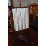 An early Victorian mahogany adjustable polescreen, height 136cmCONDITION: Top finial broken, some