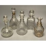 A pair of Regency glass mallet decanters with stoppers, 27cm and three other decanters (5)CONDITION: