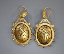 A pair of Victorian Etruscan revival yellow metal oval drop earrings, 43mm, 8.2 grams.CONDITION: