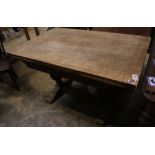 An Elizabethan style oak draw leaf extending dining table, 210cm extended width 80cm height