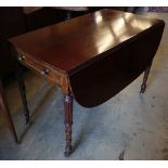 A Regency mahogany sofa table, with D shaped flats and frieze drawer on turned and fluted tapered