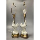 A pair of blanc de chine cockerel lamps, total height 64cm