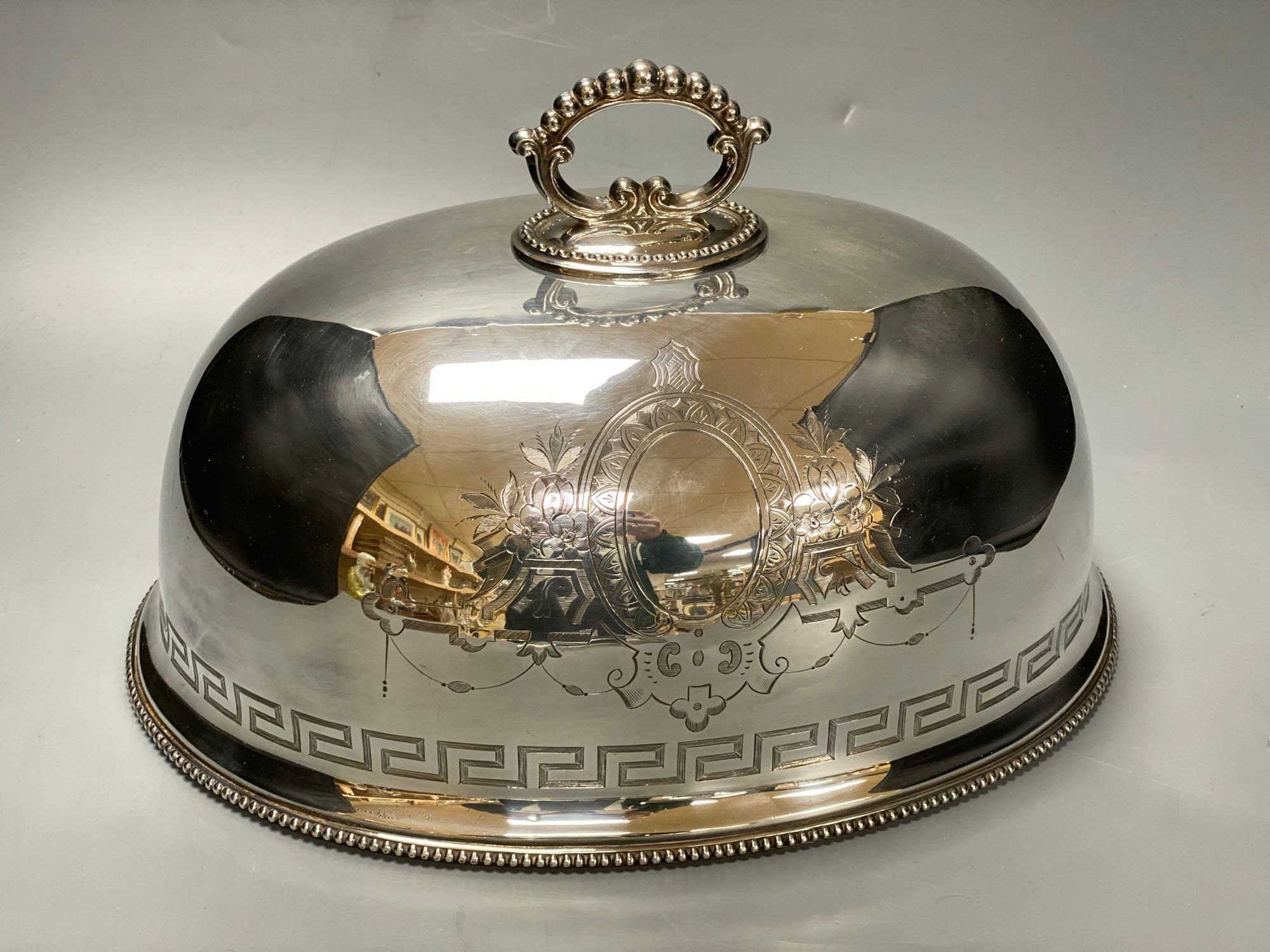 A silver plated engraved meat dome, width 33cmCONDITION: Good condition.