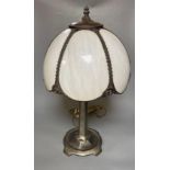 An Art Nouveau style metal table lamp with opaque white glass 'petal' shadeCONDITION: The column has