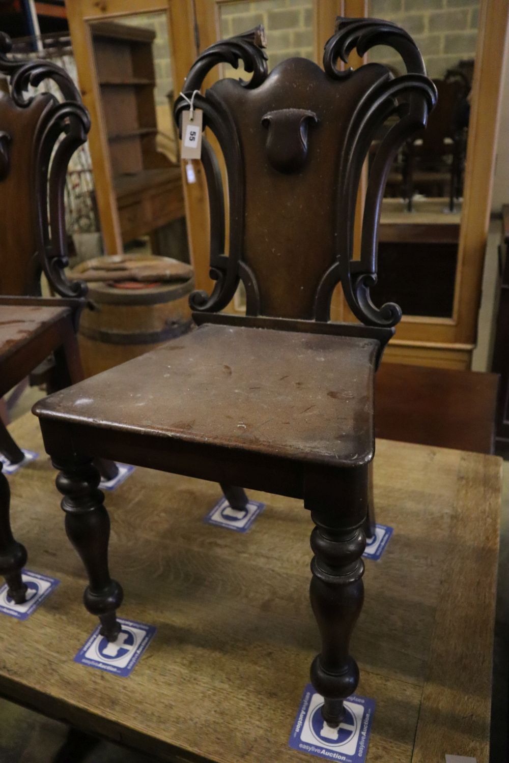 A pair of Victorian mahogany hall chairs (one a.f.)CONDITION: Fair wear and tear, one chairs has the - Image 2 of 3